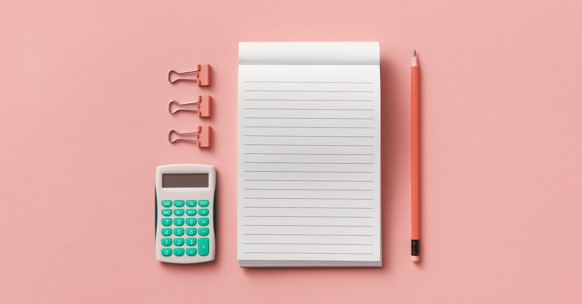 A minimalist flat lay with calculator, notepad, pencil, and clips on a pink background. — illustrating how to create a receipt